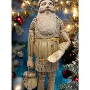Vintage Folk Art Santa Figurine with Basket Handcrafted Wood and Straw Statue